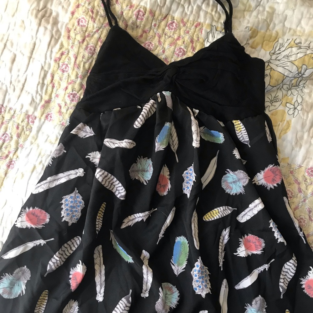 Black mini dress with feathers